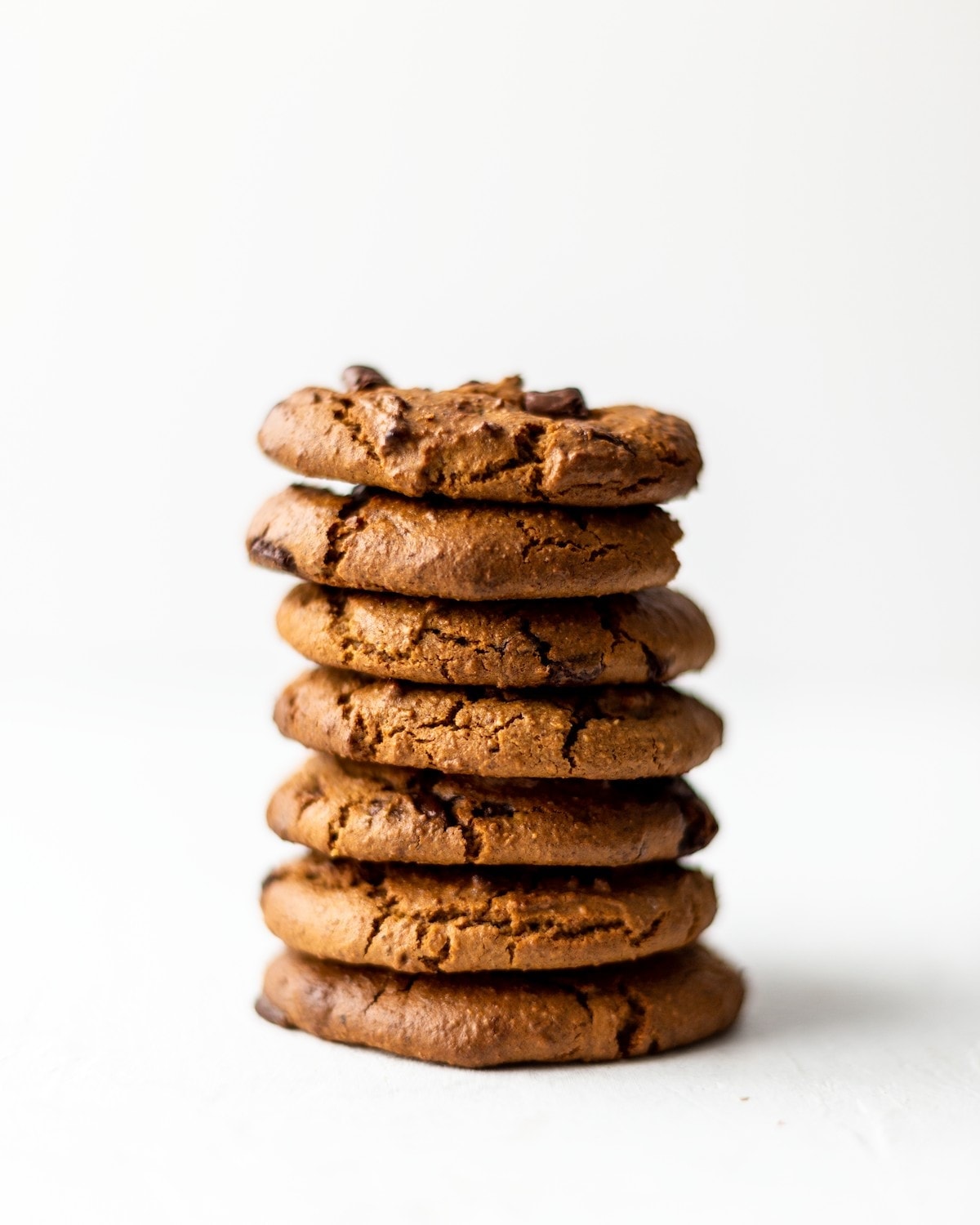 Side view of a stack of the chocolate chickpea cookies.