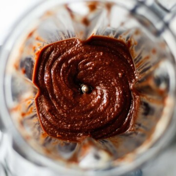 Overhead photo of a the finished chocolate orange spread in a Vitamix jug.